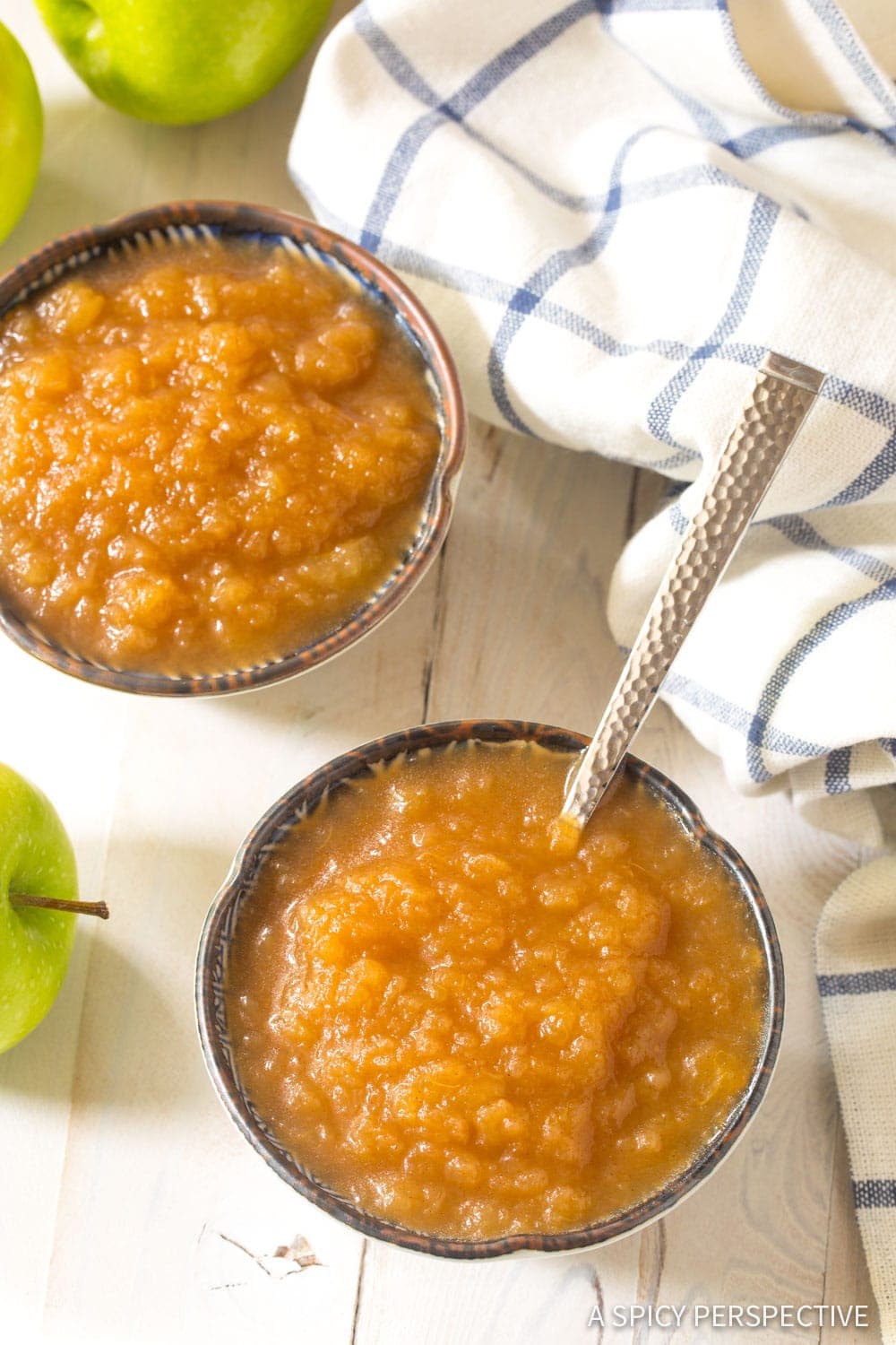 Instant Pot Applesauce in small serving cups with spoon