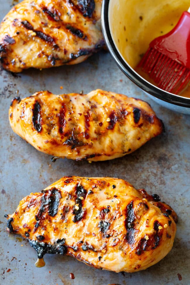 Crisp Grilled Miso Honey Chicken on a pan.