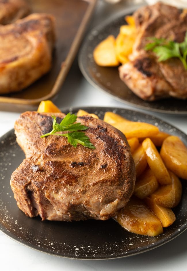 sous vide boneless pork chops or bone in chops on plate