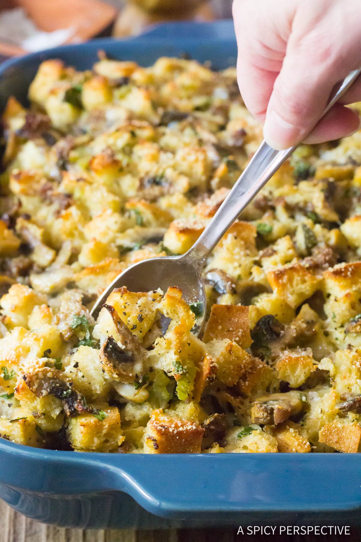 Mushroom Sausage Stuffing - close up shot in blue baking dish