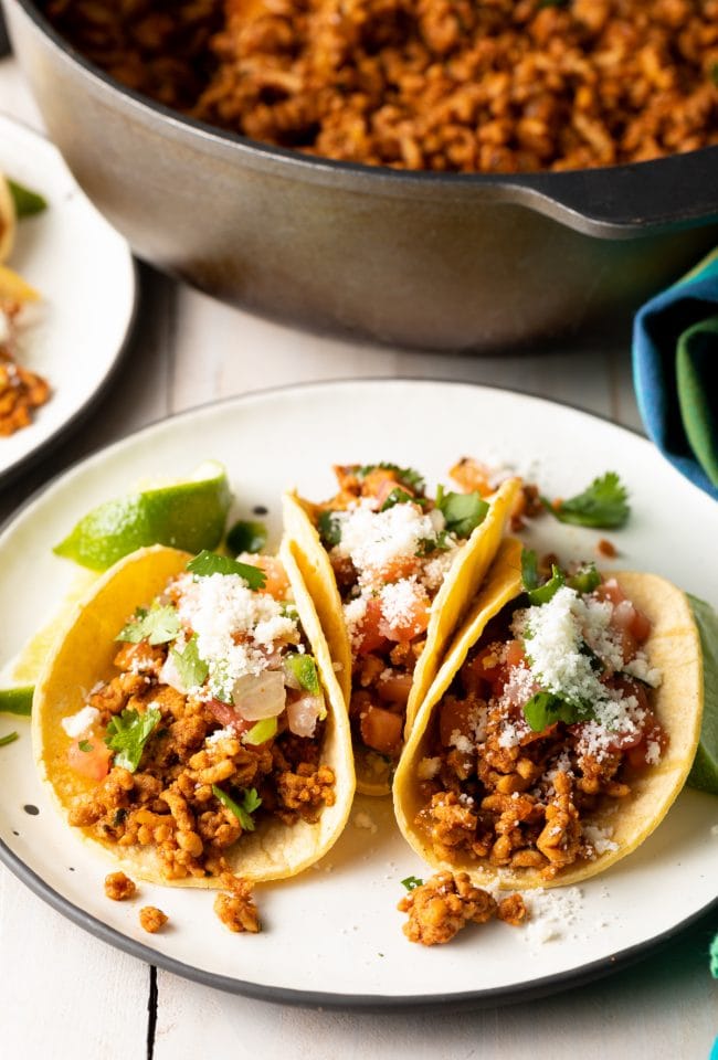 spicy ground turkey tacos on plate with skillet in the background